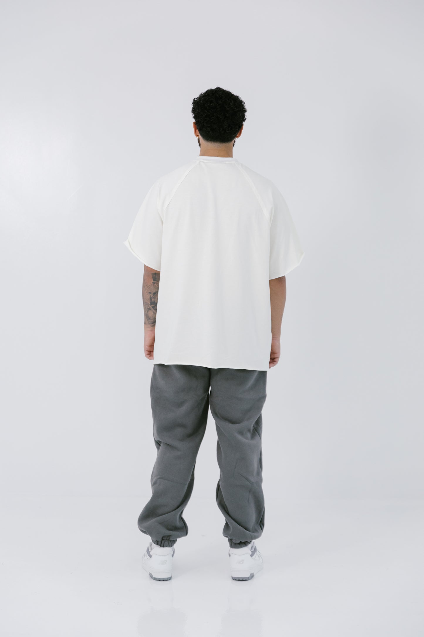 MIRAB. Oversized Unisex Curved Logo Neckline Tee in White